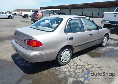 2000 Toyota Corolla Ce из США, поврежденный, VIN 1NXBR12E0YZ407281